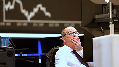 File - A trader sits on the trading floor of the Frankfurt Stock Exchange, Germany, Wednesday, 9 April 2025.